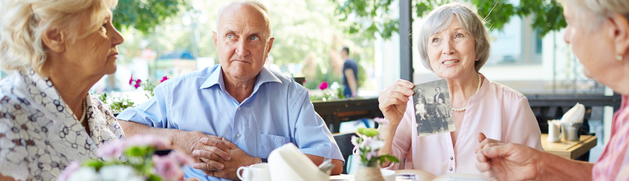 Elderly woman sharing story of her family